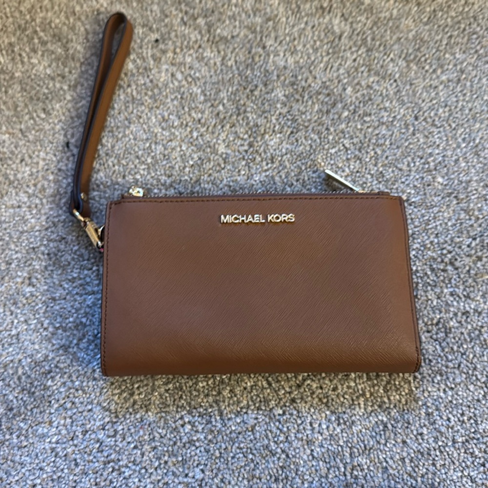 Michael Kors brown Iphone wristlet wallet